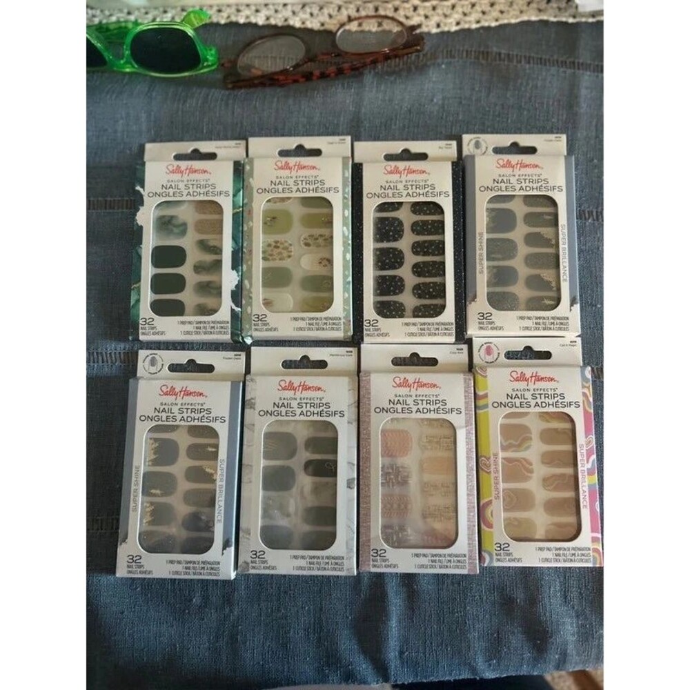 Eight sets of Sally Hansen nail strips.